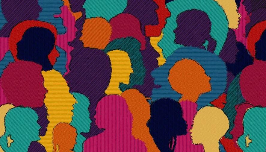 Graphic of several heads in different colors, symbolizing diversity and collaboration