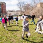  Kids, PE teachers and parents running together as part of the Boston Run Clubs